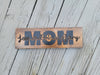MOM Names Sign